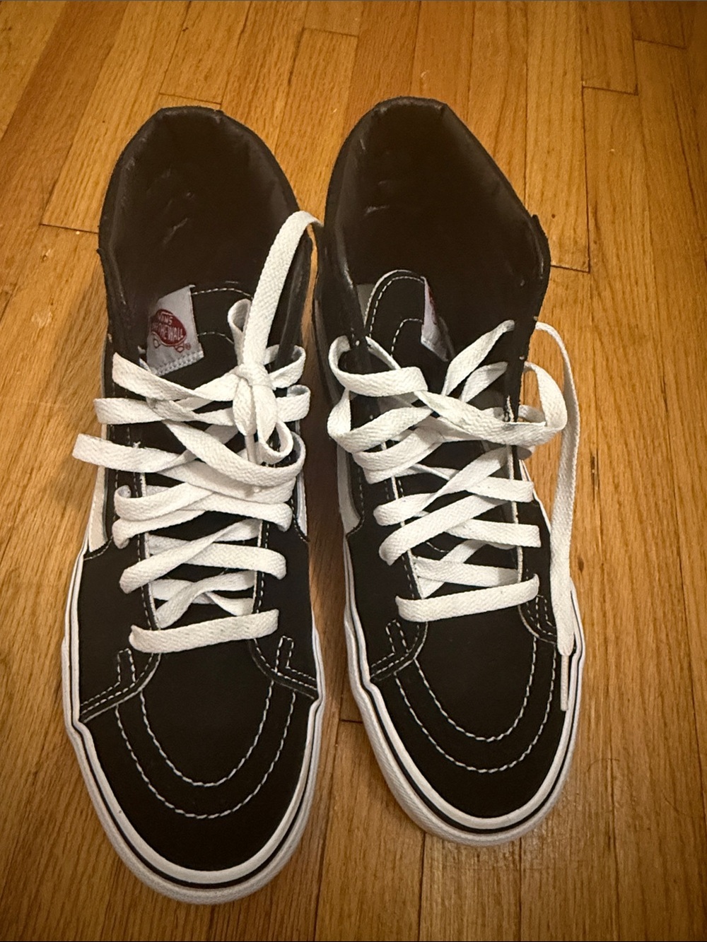 Vans Black and White High-Top Skate Sneakers
